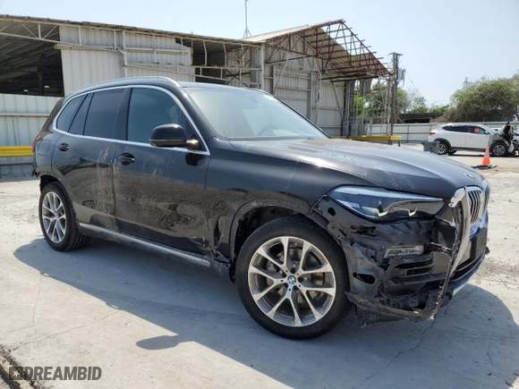 2019 BMW X5 xDrive40i with VIN 5UXCR6C50KLL21212, listed as a Copart auction lot 51939165 with 49,973 mi miles and Salvage Title. Bid and sale history available at carsss.com. Image 4.