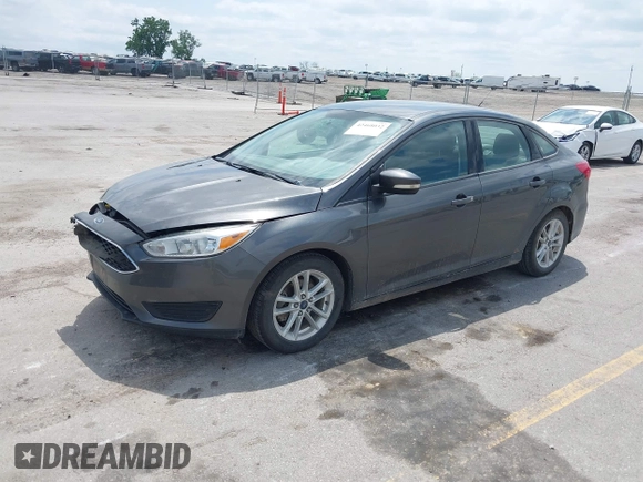 2016 Ford Focus SE z VIN 1FADP3F2XGL298174, wystawiony jako IAAI lot #42468032 z przebiegiem 236 803 mil mil oraz . Historia ofert i sprzedaży dostępna na DreamBid. Obrazek 2.