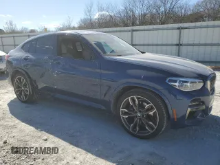 2020 BMW X4 M40i with VIN 5UX2V5C01LLE69394, listed as a Copart auction lot 44036774 with 22,582 mi miles and Clean title. Bid and sale history available at DreamBid. Image 4.