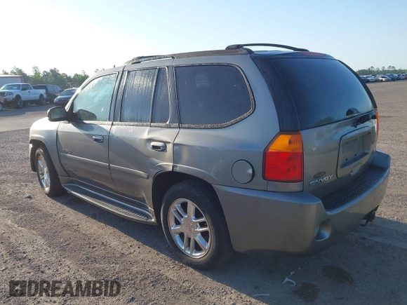 2008 GMC Envoy Denali with VIN 1GKES63M982258281, listed as a IAAI auction lot 42022548 with 265,129 mi miles. Bid and sale history available at carsss.com. Image 3.