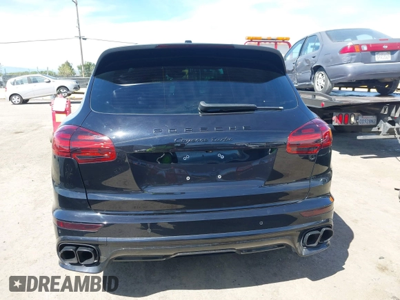 2015 Porsche Cayenne Turbo z VIN WP1AC2A2XFLA80727, wystawiony jako IAAI lot #42031257 z przebiegiem 83 368 mil mil oraz . Historia ofert i sprzedaży dostępna na DreamBid. Obrazek 16.