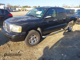 2006 Dodge Dakota SLT with VIN 1D7HE48N46S641019, listed as a IAAI auction lot 41494162 with 172,135 mi miles and . Bid and sale history available at carsss.com. Image 2.