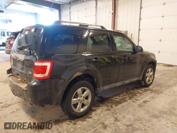 2011 Ford Escape Limited with VIN 1FMCU9EG0BKC29115, listed as a IAAI auction lot 41605426 with 189,187 mi miles. Bid and sale history available at carsss.com. Image 4.
