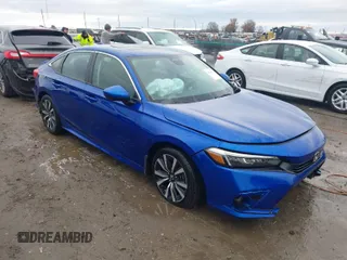 2022 Honda Civic Sedan EX with VIN 2HGFE1F74NH325843, listed as a IAAI auction lot 41116731 with 69,429 mi miles. Bid and sale history available at carsss.com. Image 1.