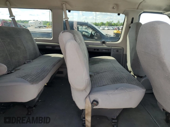 2004 Ford Econoline Passenger XL z VIN 1FBSS31S94HA00322, wystawiony jako Copart lot #57285255 z przebiegiem 224 341 mil mil oraz Szkoda całkowita • Salvage title. Historia ofert i sprzedaży dostępna na DreamBid. Obrazek 11.