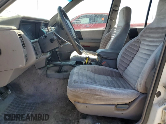 1993 Jeep Grand Cherokee Laredo с VIN 1J4GZ58S2PC654248, выставлен на аукционе Copart как лот 61259735 с пробегом 251 360 миль миль и Списание • Salvage title. История ставок и продаж доступна на DreamBid. Изображение 7.
