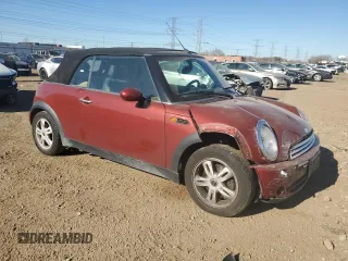 2007 MINI Convertible with VIN WMWRF33557TG17353, listed as a Copart auction lot 78946104 with 98,362 mi miles and Salvage Title. Bid and sale history available at DreamBid. Image 4.