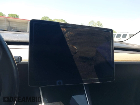 2018 Tesla Model 3 Long Range Battery with VIN 5YJ3E1EAXJF019907, listed as a IAAI auction lot 41995969 with Not Provided miles and . Bid and sale history available at DreamBid. Image 16.