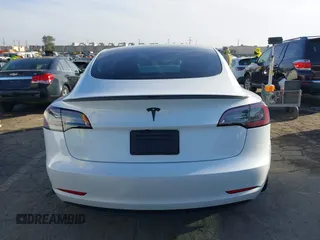 2023 Tesla Model 3 with VIN 5YJ3E1EA0PF503352, listed as a IAAI auction lot 41718658 with 28,426 mi miles and . Bid and sale history available at DreamBid. Image 16.