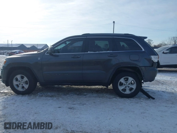 2017 Jeep Grand Cherokee Laredo with VIN 1C4RJFAG7HC876531, listed as a IAAI auction lot 41354471 with 129,056 mi miles. Bid and sale history available at carsss.com. Image 13.