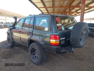 1994 Jeep Grand Cherokee Laredo with VIN 1J4GZ58S4RC280650, listed as a IAAI auction lot 42041261 with 199,265 mi miles and . Bid and sale history available at DreamBid. Image 3.