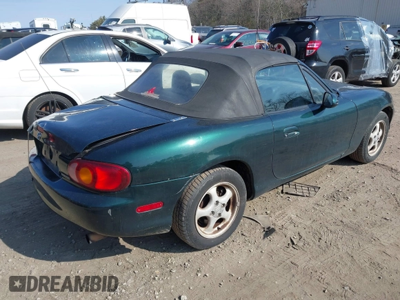 1999 Mazda MX-5 Miata with VIN JM1NB3537X0109618, listed as a IAAI auction lot 41795736 with 160,452 mi miles and . Bid and sale history available at DreamBid. Image 4.