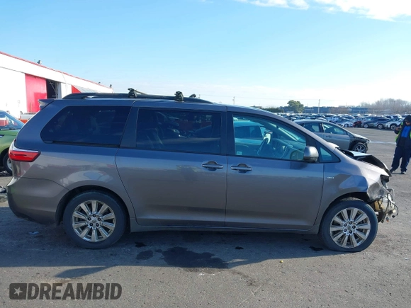 2017 Toyota Sienna LE with VIN 5TDJZ3DC2HS154993, listed as a IAAI auction lot 41372165 with 151,300 mi miles. Bid and sale history available at carsss.com. Image 14.