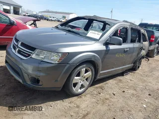 2012 Dodge Journey SXT with VIN 3C4PDDBG3CT297633, listed as a IAAI auction lot 42056704 with 188,000 mi miles and . Bid and sale history available at DreamBid. Image 2.