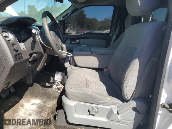 2012 Ford F-150 XL with VIN 1FTFW1EF5CFB56290, listed as a Copart auction lot 74875874 with 233,978 mi miles and Salvage title. Bid and sale history available at DreamBid. Image 7.