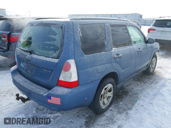 2007 Subaru Forester X with VIN JF1SG63697G718015, listed as a IAAI auction lot 41560187 with 209,572 mi miles. Bid and sale history available at carsss.com. Image 4.