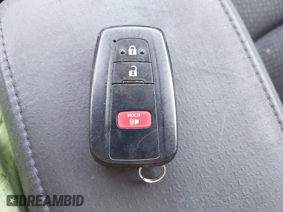 2022 Toyota Prius L Eco z VIN JTDKAMFU2N3165805, wystawiony jako IAAI lot #42428676 z przebiegiem 435 471 mil mil oraz . Historia ofert i sprzedaży dostępna na DreamBid. Obrazek 11.