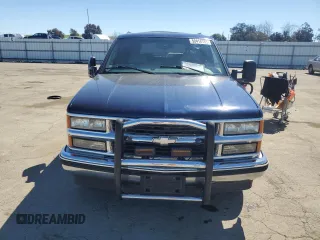 1999 Chevrolet Suburban with VIN 1GNEC16R1XJ394144, listed as a Copart auction lot 50418185 with 173,037 mi miles and Salvage title. Bid and sale history available at DreamBid. Image 5.