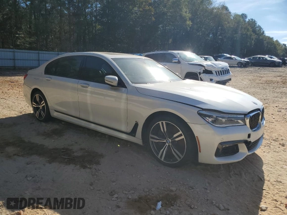2016 BMW 7 Series 750i with VIN WBA7F0C58GGM20723, listed as a Copart auction lot 80143764 with 102,311 mi miles and Salvage Title. Bid and sale history available at carsss.com. Image 4.