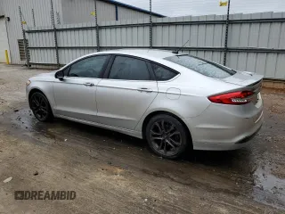 2018 Ford Fusion S z VIN 3FA6P0G71JR222742, wystawiony jako Copart lot #54545715 z przebiegiem 219 261 mil mil oraz Szkoda całkowita • Salvage title. Historia ofert i sprzedaży dostępna na DreamBid. Obrazek 2.