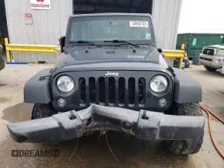 2017 Jeep Wrangler Sport with VIN 1C4AJWAGXHL540496, listed as a Copart auction lot 50692705 with 115,042 mi miles and Salvage Title. Bid and sale history available at DreamBid. Image 5.