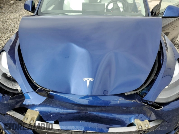 2024 Tesla Model Y Long Range с VIN 7SAYGDEE5RF983771, выставлен на аукционе Copart как лот 86153274 с пробегом 4 105 миль миль и Списание • Salvage title. История ставок и продаж доступна на DreamBid. Изображение 12.