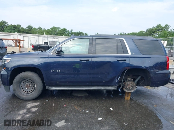 2018 Chevrolet Tahoe LT with VIN 1GNSKBKC7JR256937, listed as a IAAI auction lot 42614438 with 92,794 mi miles and . Bid and sale history available at DreamBid. Image 14.
