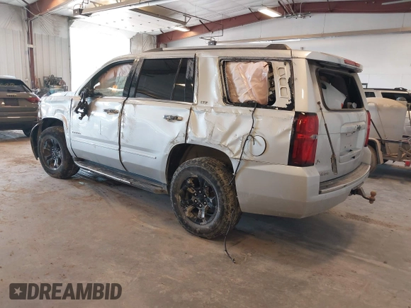 2016 Chevrolet Tahoe LTZ with VIN 1GNSKCKCXGR477284, listed as a IAAI auction lot 42221589 with Not provided miles and . Bid and sale history available at DreamBid. Image 3.