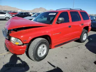 2000 Dodge Durango with VIN 1B4HS28Z2YF279002, listed as a Copart auction lot 84460864 with 117,213 mi miles and Salvage Title. Bid and sale history available at DreamBid. Image 1.