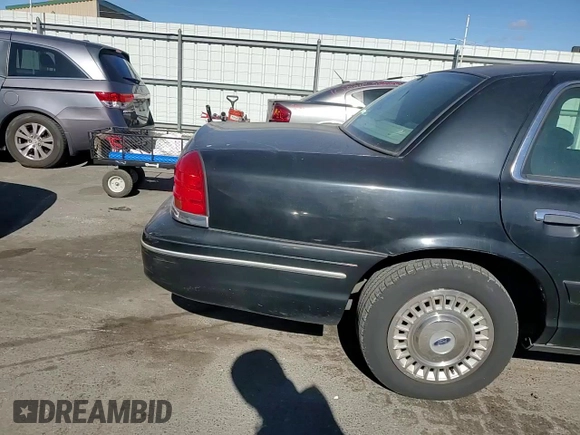 2001 Ford Crown Victoria Police Interceptor z VIN 2FAFP71W41X205475, wystawiony jako Copart lot #75265194 z przebiegiem 117 633 mil mil oraz Szkoda całkowita • Salvage title. Historia ofert i sprzedaży dostępna na DreamBid. Obrazek 11.