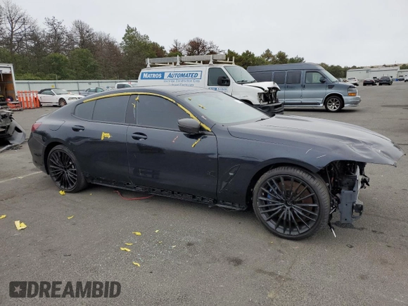 2020 BMW 8 Series M850i with VIN WBAGV8C04LCE45015, listed as a Copart auction lot 73153414 with 25,190 mi miles and Salvage title. Bid and sale history available at DreamBid. Image 4.