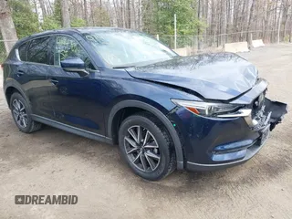 2018 Mazda CX-5 Grand Touring with VIN JM3KFBDM3J0377866, listed as a IAAI auction lot 41947014 with 70,446 mi miles. Bid and sale history available at carsss.com. Image 1.