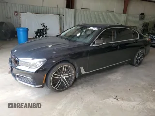 2017 BMW 7 Series 740i with VIN WBA7E2C36HG741125, listed as a Copart auction lot 55754185 with 90,305 mi miles and Clean Title. Bid and sale history available at DreamBid. Image 1.