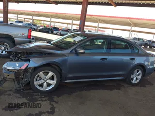 2015 Volkswagen Passat Wolfsburg Edition with VIN 1VWAT7A39FC072347, listed as a IAAI auction lot 42610199 with 116,957 mi miles and . Bid and sale history available at DreamBid. Image 14.