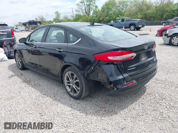 2020 Ford Fusion SEL z VIN 3FA6P0CD5LR131097, wystawiony jako IAAI lot #42218517 z przebiegiem 94 394 mil mil oraz . Historia ofert i sprzedaży dostępna na DreamBid. Obrazek 3.