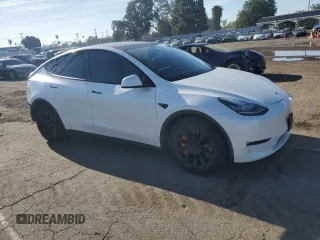 2022 Tesla Model Y Long Range with VIN 7SAYGDEE1NF339663, listed as a Copart auction lot 49771965 with 33,734 mi miles and Salvage Title. Bid and sale history available at carsss.com. Image 4.