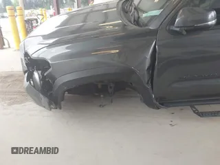 2019 Toyota Tacoma SR z VIN 3TMCZ5AN1KM257081, wystawiony jako IAAI lot #42211385 z przebiegiem 60 229 mil mil oraz . Historia ofert i sprzedaży dostępna na DreamBid. Obrazek 6.