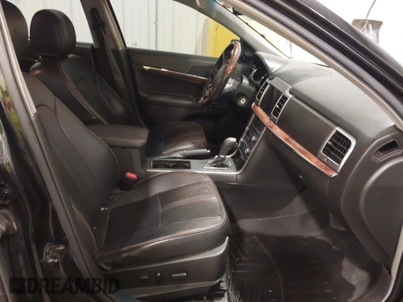2012 Lincoln MKZ with VIN 3LNHL2GC1CR826247, listed as a IAAI auction lot 41727774 with 136,588 mi miles. Bid and sale history available at carsss.com. Image 5.