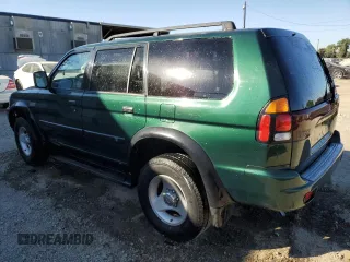 2001 Mitsubishi Montero ES z VIN JA4LS21H01P043215, wystawiony jako Copart lot #77391904 z przebiegiem 148 705 mil mil oraz Tytuł czysty. Historia ofert i sprzedaży dostępna na DreamBid. Obrazek 2.