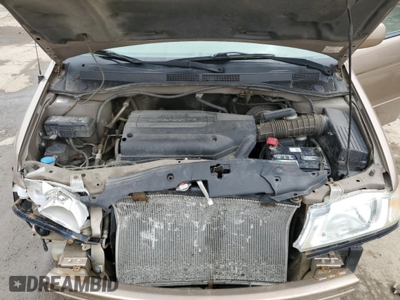 2004 Honda Odyssey EX with VIN 5FNRL186X4B127827, listed as a Copart auction lot 51602565 with 182,127 mi miles and Salvage Title. Bid and sale history available at DreamBid. Image 12.