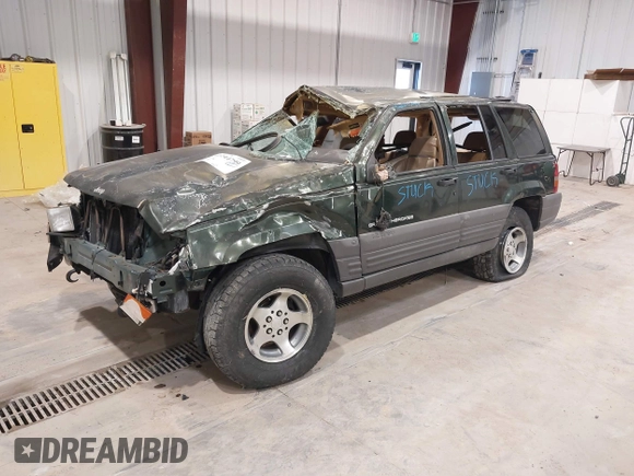 1997 Jeep Grand Cherokee Laredo z VIN 1J4GZ58YXVC729117, wystawiony jako IAAI lot #42244799 z przebiegiem Nie podano mil oraz . Historia ofert i sprzedaży dostępna na DreamBid. Obrazek 21.