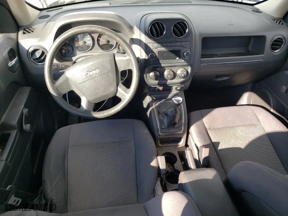 2010 Jeep Patriot Sport with VIN 1J4NT2GA9AD506311, listed as a Copart auction lot 83174964 with 231,694 mi miles and Clean Title. Bid and sale history available at carsss.com. Image 8.