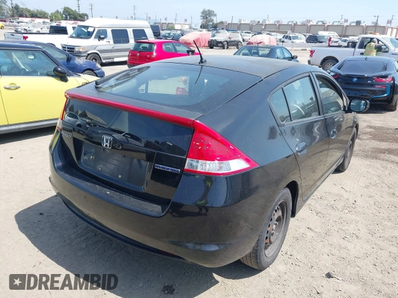 2010 Honda Insight LX with VIN JHMZE2H50AS014165, listed as a IAAI auction lot 42381535 with 169,032 mi miles and . Bid and sale history available at DreamBid. Image 4.