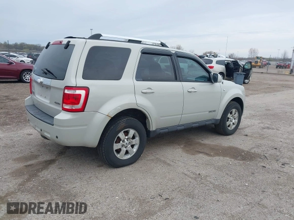2008 Ford Escape Limited with VIN 1FMCU94108KB33023, listed as a IAAI auction lot 41956715 with 144,421 mi miles. Bid and sale history available at carsss.com. Image 4.