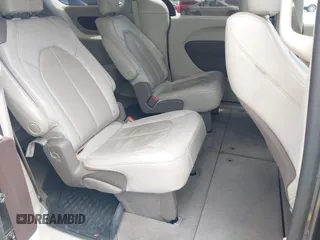 2020 Chrysler Pacifica Touring L with VIN 2C4RC1BG1LR269004, listed as a IAAI auction lot 42287228 with 71,498 mi miles and . Bid and sale history available at DreamBid. Image 8.