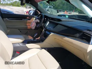 2018 Cadillac XT5 FWD with VIN 1GYKNARS2JZ160862, listed as a IAAI auction lot 42584234 with 152,785 mi miles and . Bid and sale history available at DreamBid. Image 5.