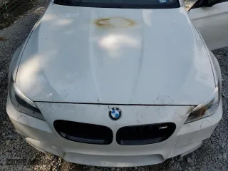 2015 BMW M5 with VIN WBSFV9C5XFD595229, listed as a Copart auction lot 63020514 with 0 mi miles and Salvage Title. Bid and sale history available at carsss.com. Image 11.