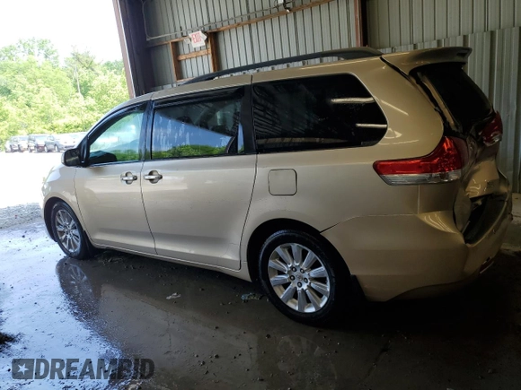 2011 Toyota Sienna XLE with VIN 5TDDK3DC7BS009764, listed as a Copart auction lot 59179775 with 197,145 mi miles and Salvage title. Bid and sale history available at DreamBid. Image 2.