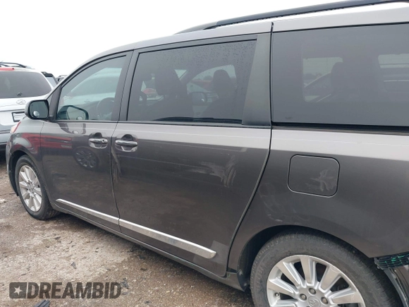 2011 Toyota Sienna XLE AAS with VIN 5TDYK3DC9BS158209, listed as a IAAI auction lot 42163526 with 107,385 mi miles and . Bid and sale history available at DreamBid. Image 15.