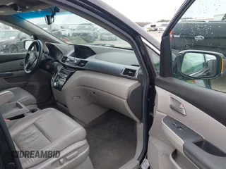 2012 Honda Odyssey Touring with VIN 5FNRL5H96CB058828, listed as a IAAI auction lot 41731389 with 152,295 mi miles and . Bid and sale history available at DreamBid. Image 5.